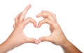 Teenager hands form a heart shape