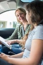 Teenager Having Driving Lesson With Female Instructor Royalty Free Stock Photo