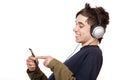 Teenager with headphone use mp3 music player Royalty Free Stock Photo