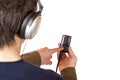 Teenager with headset use mp3 music player