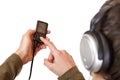 Teenager with headset use mp3 music player