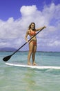 Teenager on her paddleboard Royalty Free Stock Photo