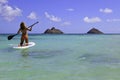 Teenager on her paddleboard Royalty Free Stock Photo