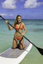 Teenager on her paddleboard Royalty Free Stock Photo
