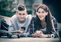 Teenager and his girlfriend with smartphones Royalty Free Stock Photo