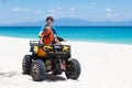 Kids on quad bike. Off road all terrain vehicle Royalty Free Stock Photo