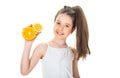 Teenager holding citrus orange fruit. Beautiful little girl with oranges, lemons, grapefruits, vitamin. Baby girl