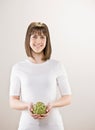 Teenager holding fresh artichoke Royalty Free Stock Photo