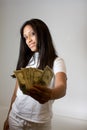 Teenager holding money (american dollars)