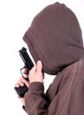 Teenager in the hood with gun. Royalty Free Stock Photo