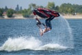 Teenager on Jet Ski-Water Sports in the summer having fun on the beach