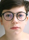 Teenager kid boy in myopia correction glasses Royalty Free Stock Photo