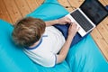 Teenager with laptop Royalty Free Stock Photo