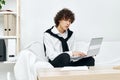 teenager laptop sitting on white sofa online training Lifestyle technology Royalty Free Stock Photo