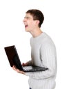 Teenager laughing with Laptop