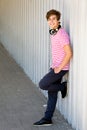 Teenager leaning against wall Royalty Free Stock Photo