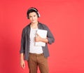 Teenager listen music via headphones on notebook Royalty Free Stock Photo