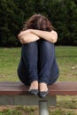 Teenager lonely depressed and sadness in a park