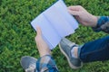 Teenager looking at a notebook