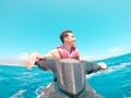 Teenager man enjoying summer in a jet ski in the middle of the sea having fun racing alone and isolated Royalty Free Stock Photo