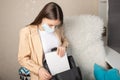 Teenager in a medical mask is going to school, prevention of diseases in colleges, universities, coronavirus rules during a