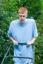 Teenager Mowing the Lawn 3 Royalty Free Stock Photo