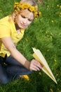 Teenager and paper plane Royalty Free Stock Photo