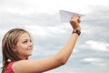 Teenager and paper plane Royalty Free Stock Photo
