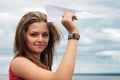 Teenager and paper plane Royalty Free Stock Photo