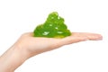 teenager playing green slime with hand, transparent toy