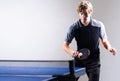 Young sportsman playing table tennis Royalty Free Stock Photo