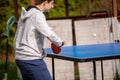 Teenager playing table tennis