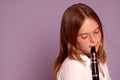 Teenager plays clarinet