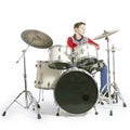 Teenager plays drums in studio with white background Royalty Free Stock Photo