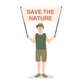 A teenager with a poster in defense of nature and humanity