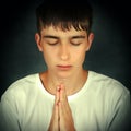 Teenager praying