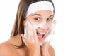Teenager problem skin care - woman wash face Royalty Free Stock Photo