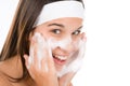 Teenager problem skin care - woman wash face Royalty Free Stock Photo