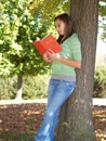 Teenager reading a book Royalty Free Stock Photo