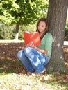 Teenager reading a book Royalty Free Stock Photo