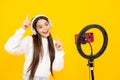 Music kids blog. Teenager recording online media video. Teen girl streaming online and sharing social media content by Royalty Free Stock Photo