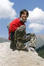 Teenager in red sport pullover in mountain Royalty Free Stock Photo