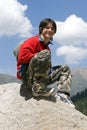 Teenager in red sport pullover in mountain Royalty Free Stock Photo