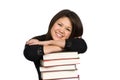 Teenager resting head on books Royalty Free Stock Photo