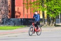 Teenager Riding Bicycle While on the Phone Royalty Free Stock Photo