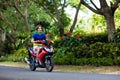 Teenager riding scooter. Boy on motorcycle. Royalty Free Stock Photo