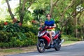 Teenager riding scooter. Boy on motorcycle. Royalty Free Stock Photo