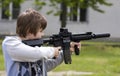 Teenager with rifle Royalty Free Stock Photo