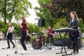 Teenager rock music band performing on the street Royalty Free Stock Photo