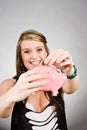 Teenager saving money Royalty Free Stock Photo